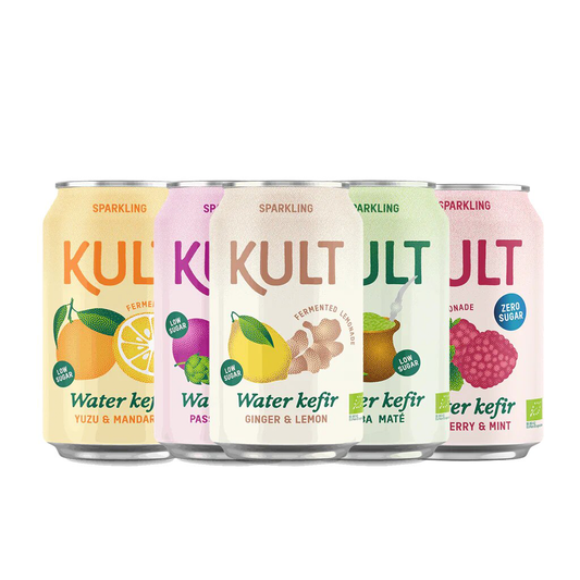 Five cans of KULT water kefir on a white background